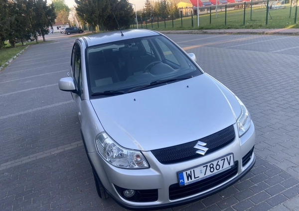 Suzuki SX4 cena 21900 przebieg: 156500, rok produkcji 2010 z Legionowo małe 232